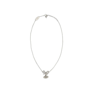Vivienne Westwood silver chain necklace with a crystal-embellished bow and orb pendant.