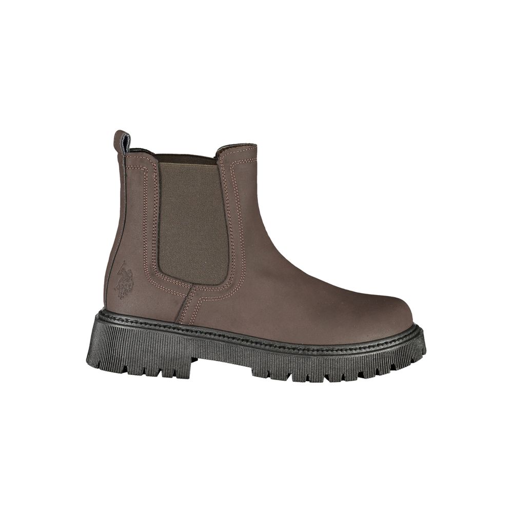 U.S. POLO ASSN. brown polyethylene ankle boot with elastic side gore, heel pull tab, and thick black lug sole.