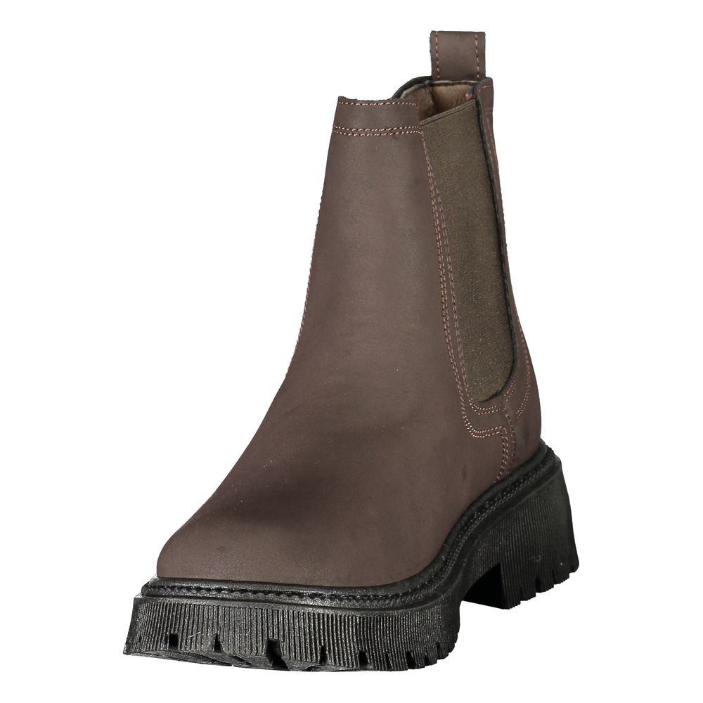 U.S. POLO ASSN. brown polyethylene ankle boots with elastic side panels, a rear pull tab, and a black lug sole.