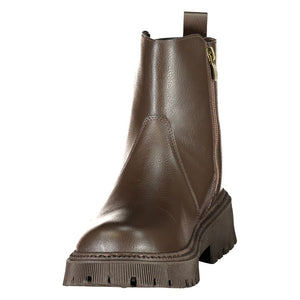 Brown polyethylene ankle boot with side zipper, heel pull tab, and chunky lug sole.