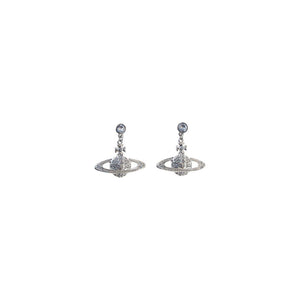 Vivienne Westwood silver brass earrings featuring crystal-embellished orb pendants with Saturn rings.