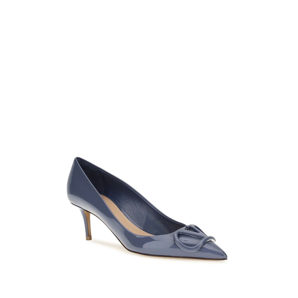 Blue patent leather pointed-toe pump with a stiletto heel and a tonal logo detail.