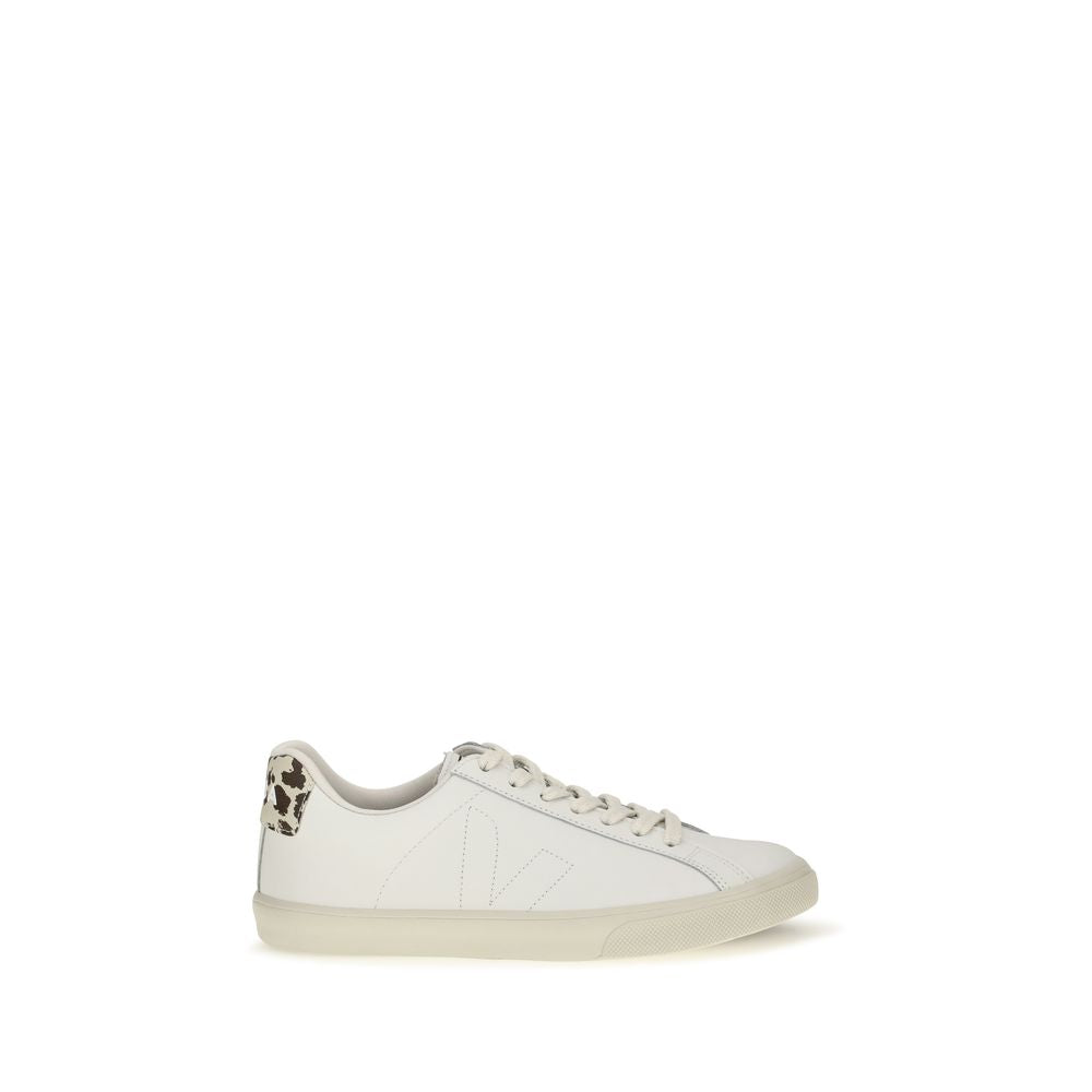 Veja white leather low top sneaker with cow-print calf hair heel tab and flat laces.