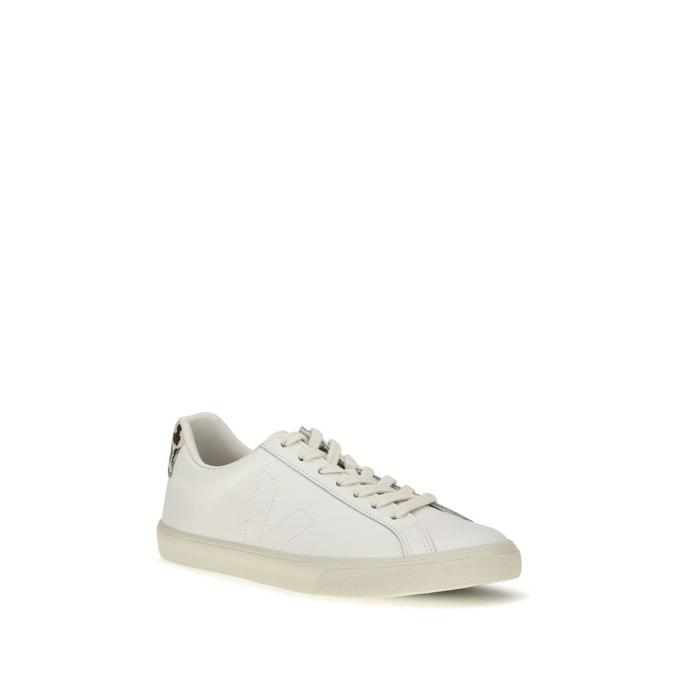 Veja white leather low-top sneaker with flat laces, perforated V logo, and cow-print heel tab.