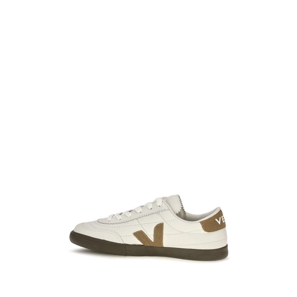 Veja white leather low top sneaker with brown suede logo and heel tab, white laces, and dark sole.