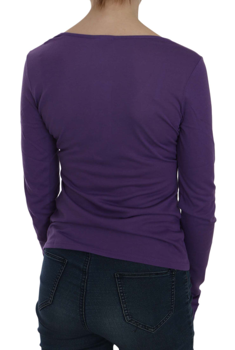 Purple long sleeve casual top from the back worn with jeans