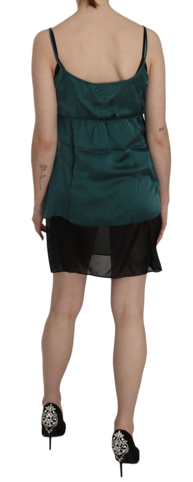 Green silk spaghetti strap shift mini dress with a sheer black hem panel