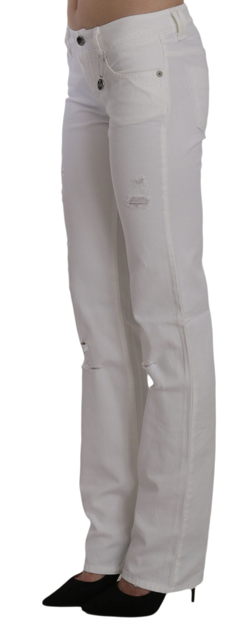 Costume National white cotton slim fit straight jeans with subtle distressing worn with black heels