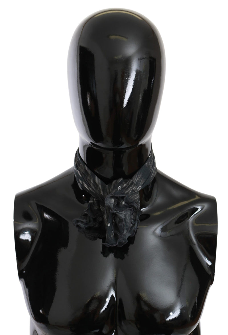 Black and gray patterned viscose foulard scarf tied neatly around a black mannequin neck