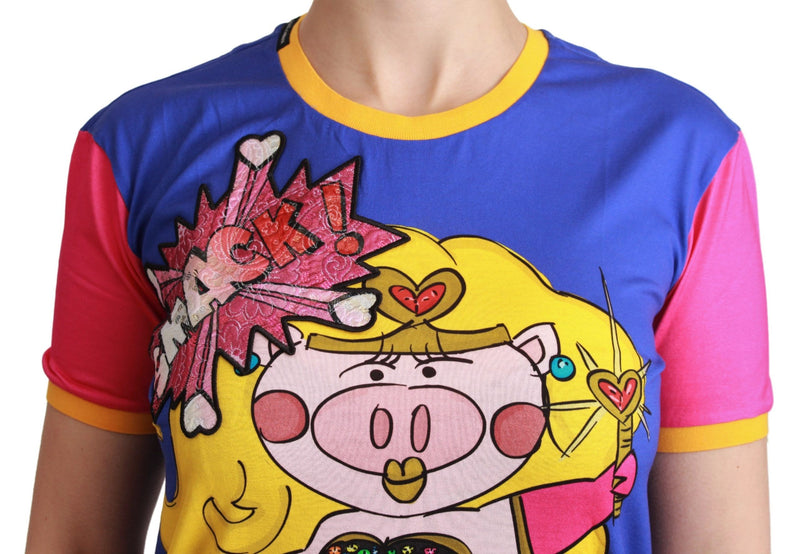 Blue and pink cotton t-shirt featuring a cartoon pig supergirl graphic with a comic book style explosion