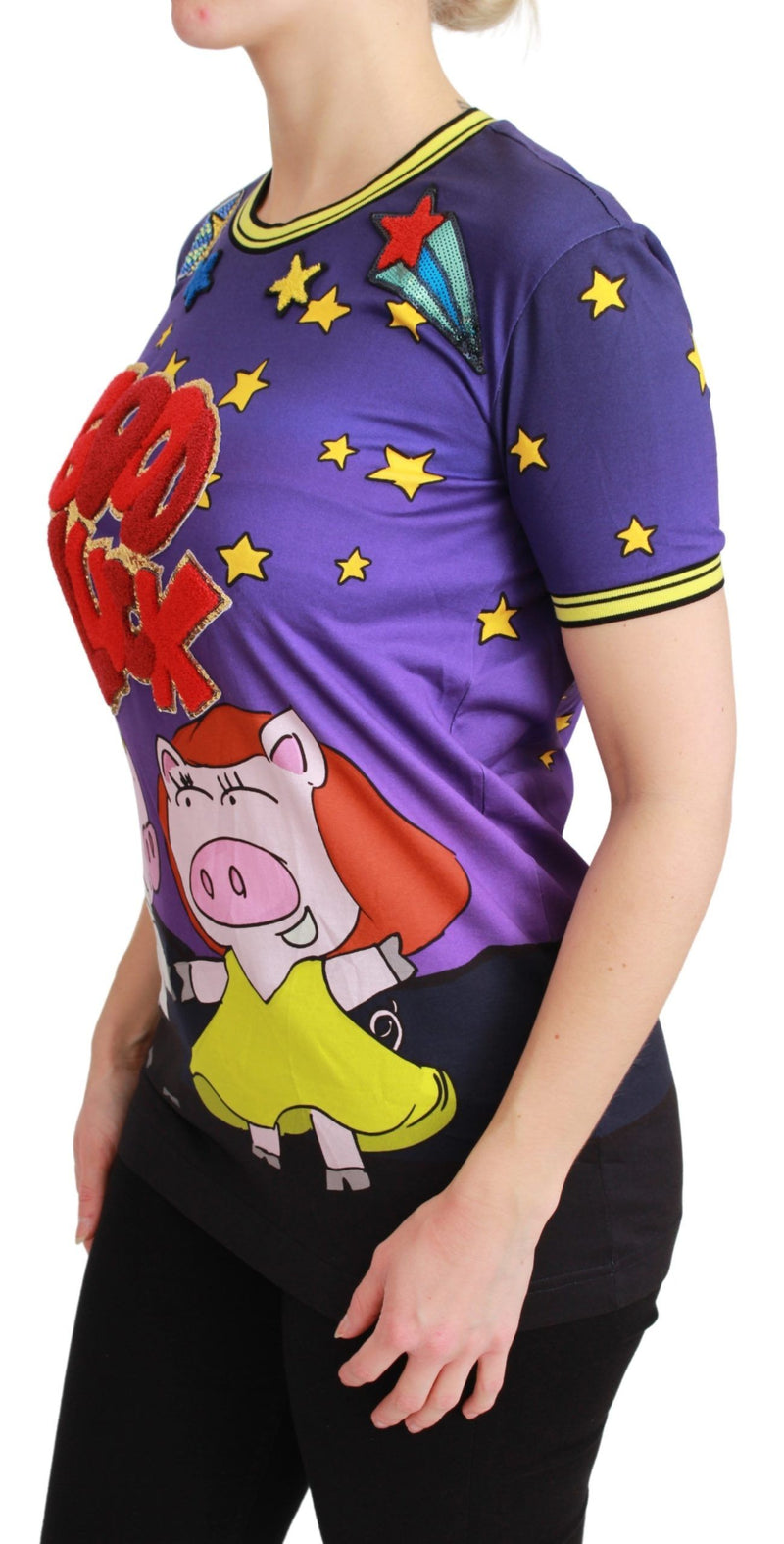 Purple cotton t-shirt with short sleeves, featuring a pig graphic, star prints, and red appliques