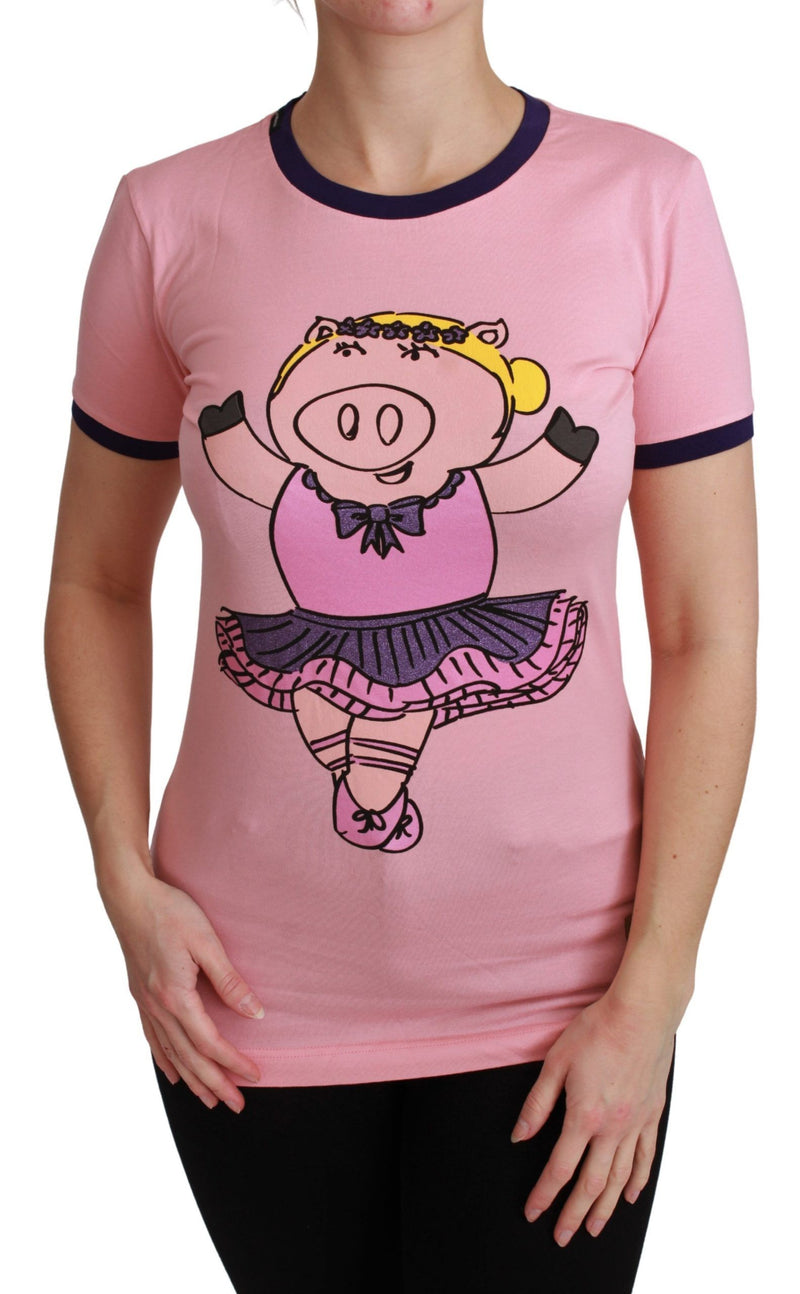 Pink cotton short-sleeve t-shirt featuring a dancing pig graphic and dark blue ringer collar and cuffs