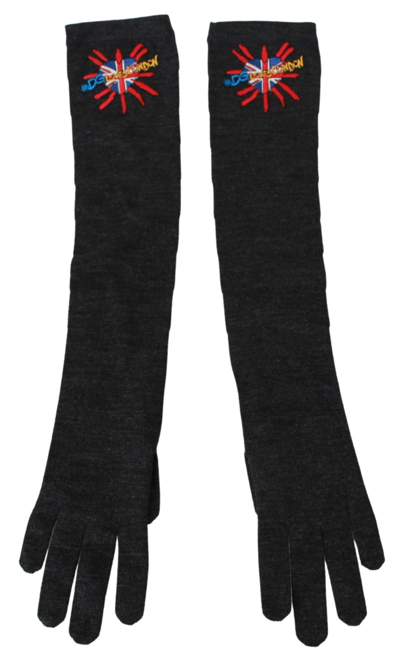 Dark gray wool long gloves featuring colorful embroidered London heart patches on the upper cuffs