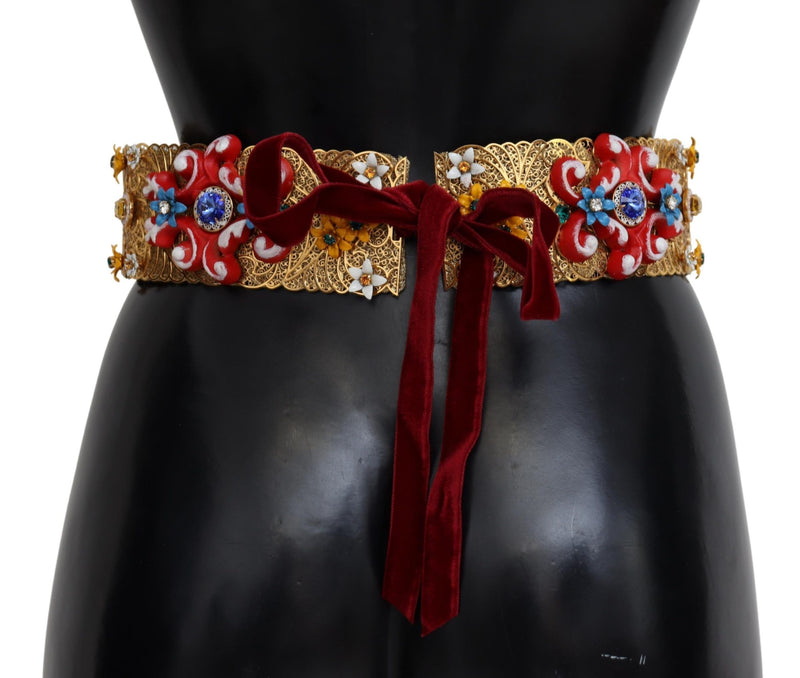 Wide gold filigree waist belt with red floral enamel, crystals, and a dark red velvet tie closure