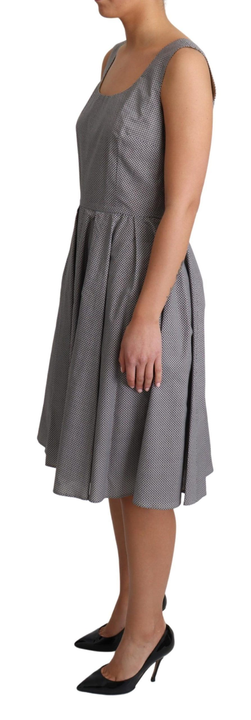 Blue and beige geometric cotton sleeveless A-line dress worn with black heels