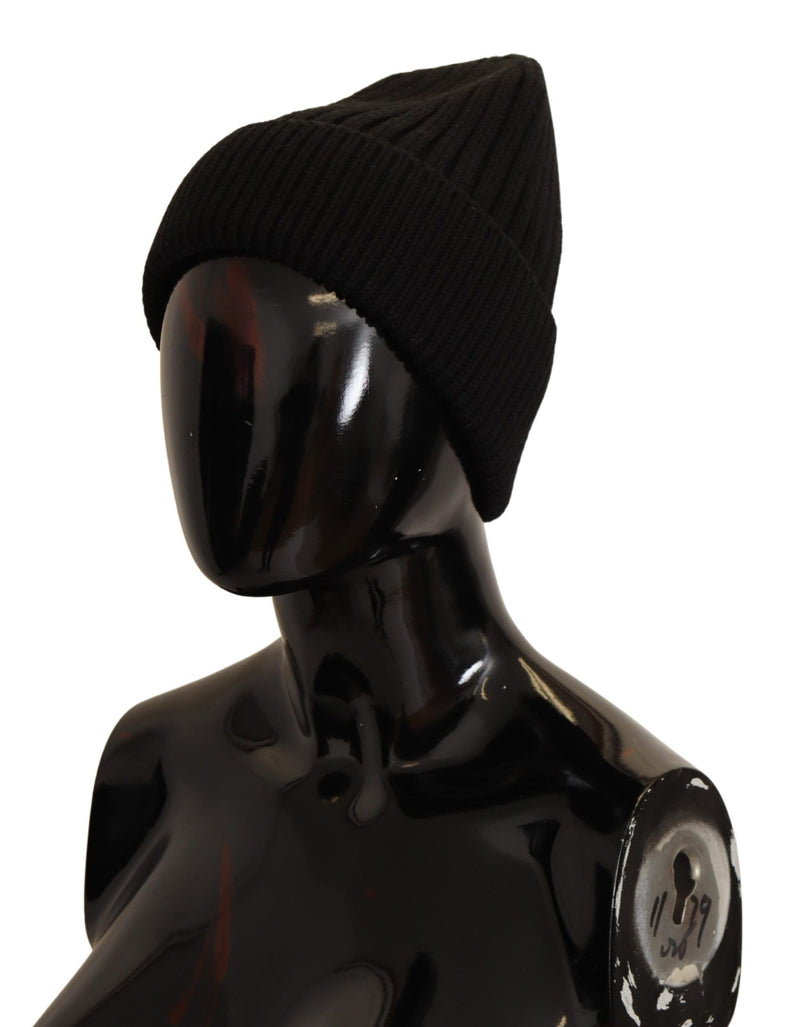 Black ribbed wool knit winter beanie hat on a mannequin
