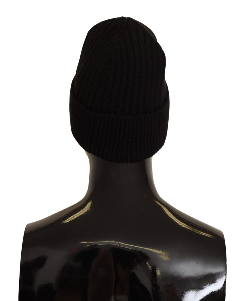 Black ribbed wool knit winter beanie hat on a mannequin