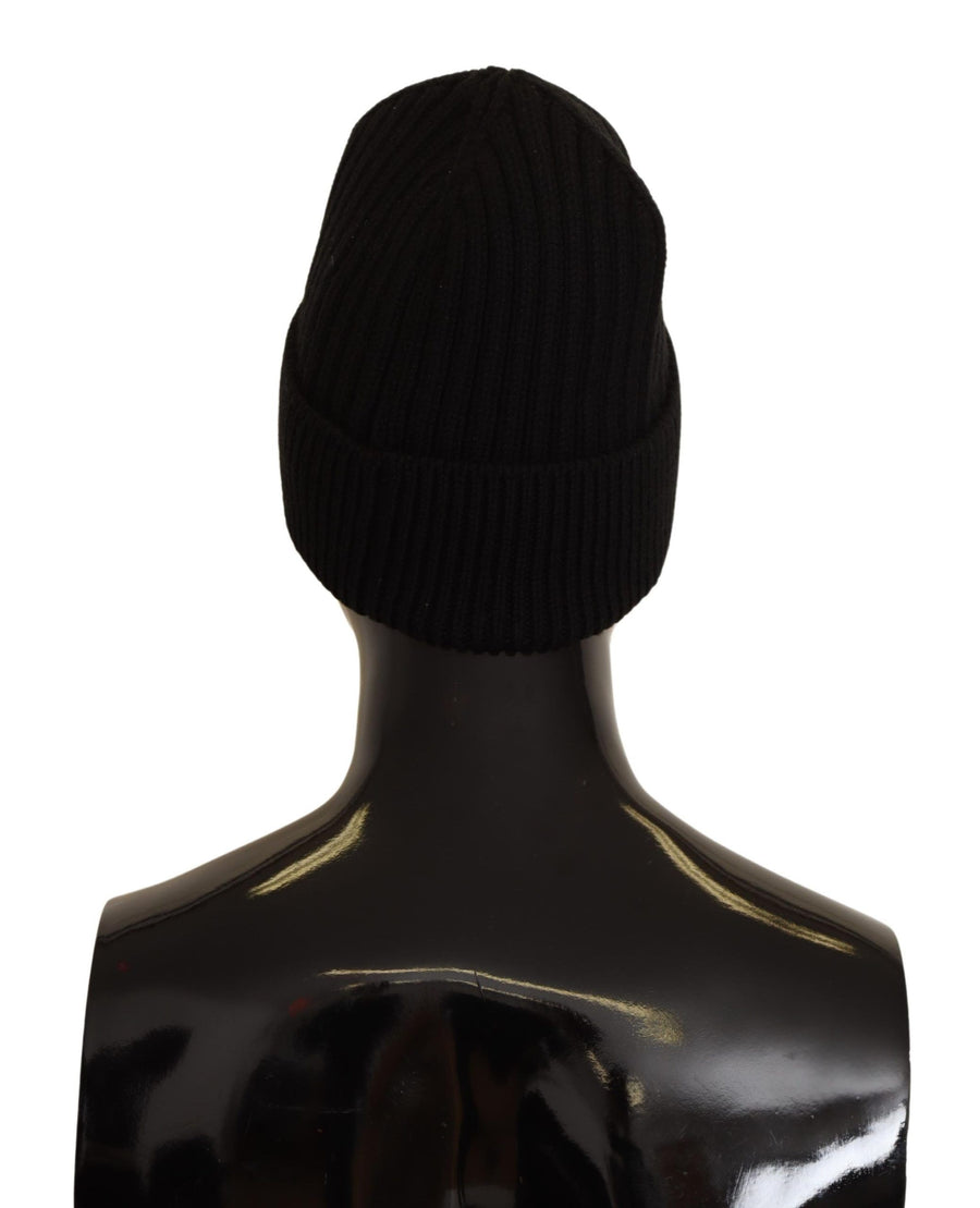 Black ribbed wool knit winter beanie hat on a mannequin