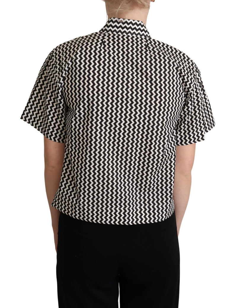 Black and white zigzag print short-sleeve cotton collared shirt worn from the back