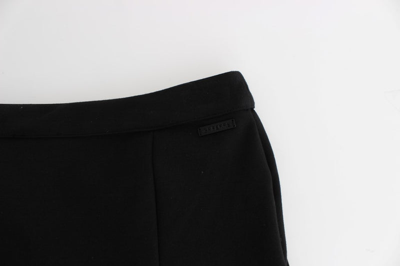 Black cotton straight pencil skirt waistband with subtle brand logo plaque