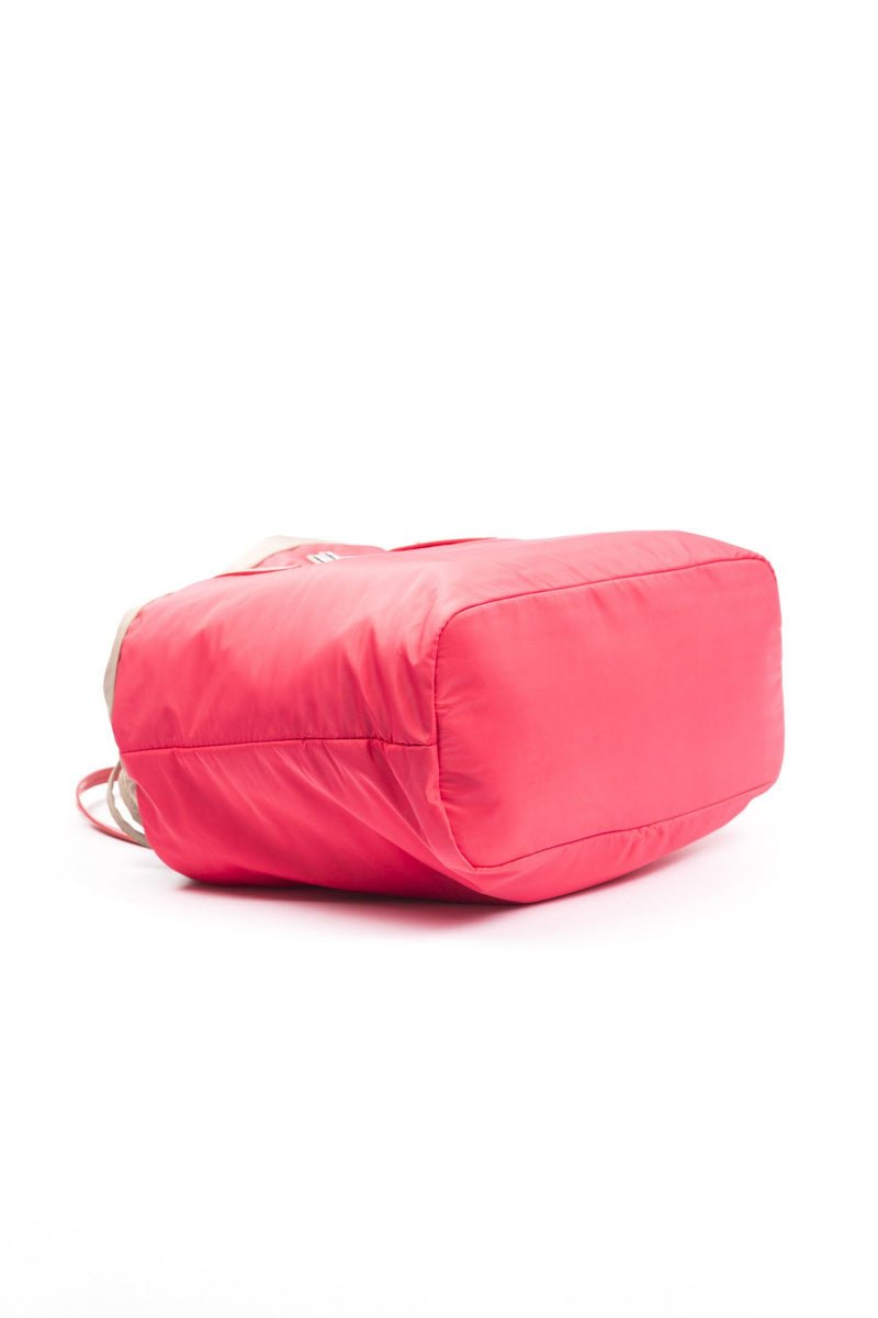 Red polyester women shoulder bag lying on its side