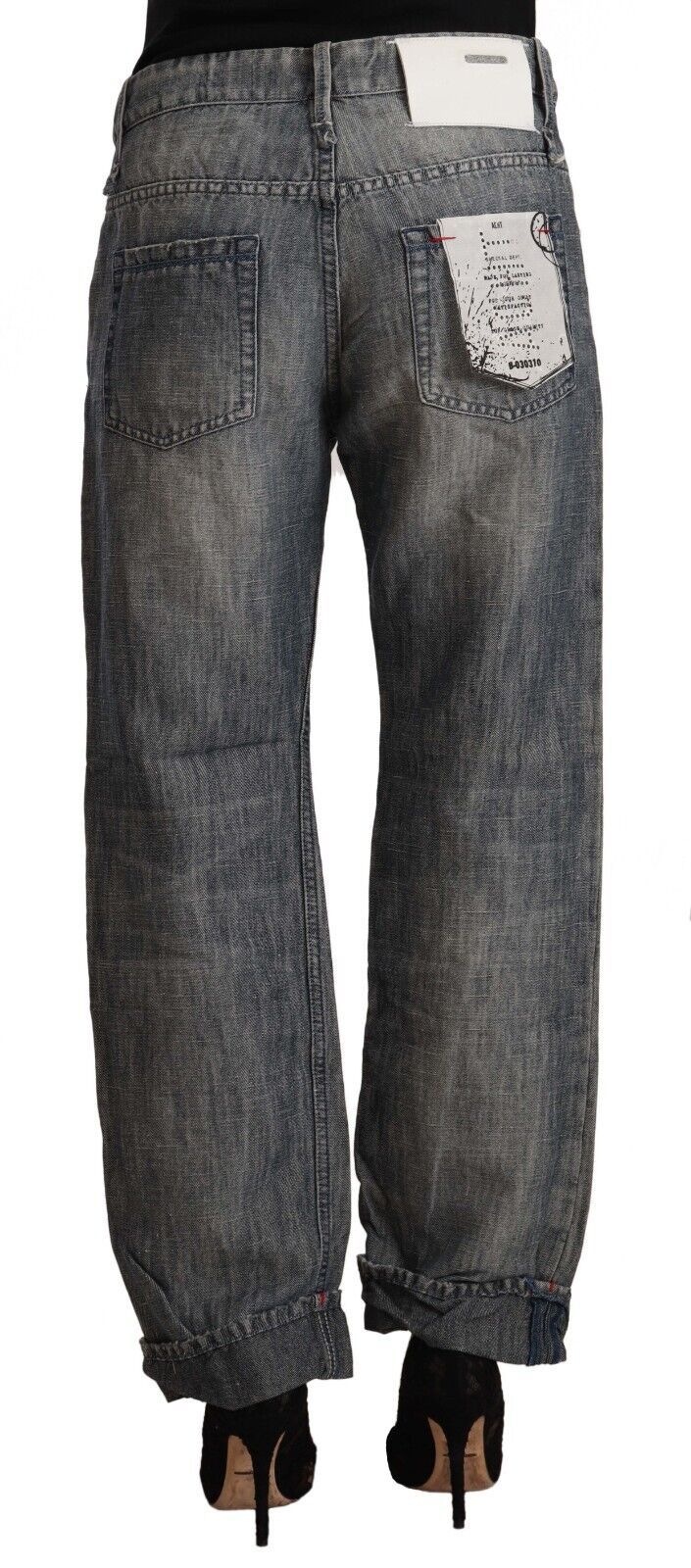 Gray washed ramie straight denim jeans with folded hems viewed from behind