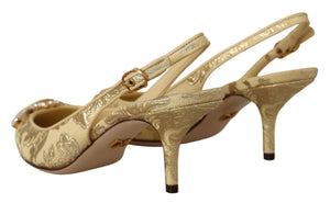Dolce & Gabbana gold brocade fabric slingback pumps with a crystal-embellished toe and a mid-height stiletto heel.