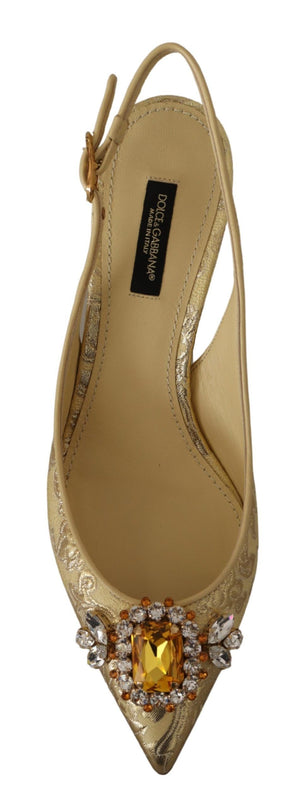 Dolce & Gabbana gold metallic fabric slingback pumps with a pointed toe and a large, crystal-embellished brooch.