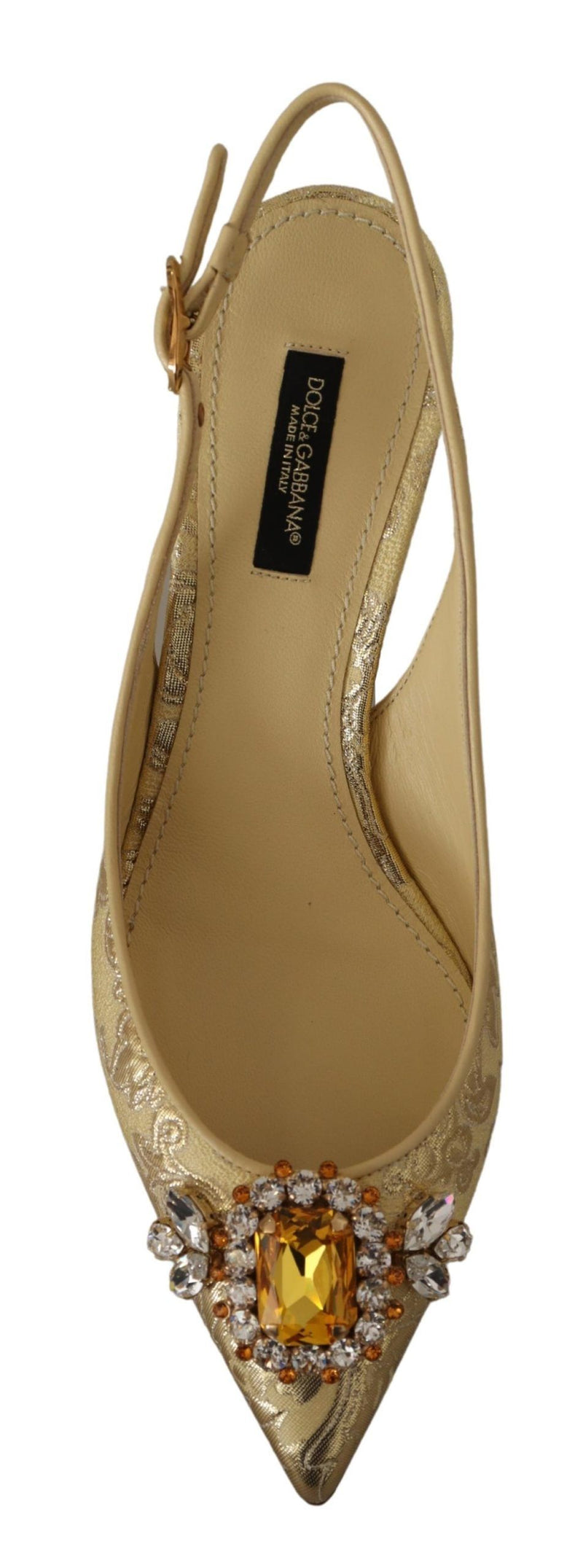 Dolce & Gabbana gold metallic fabric slingback pumps with a pointed toe and a large, crystal-embellished brooch.