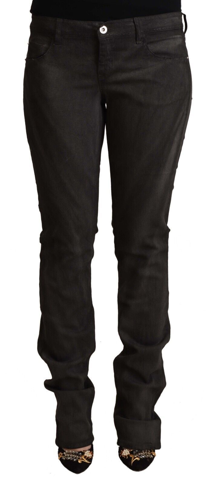 Black cotton mid-rise skinny pants worn by a model