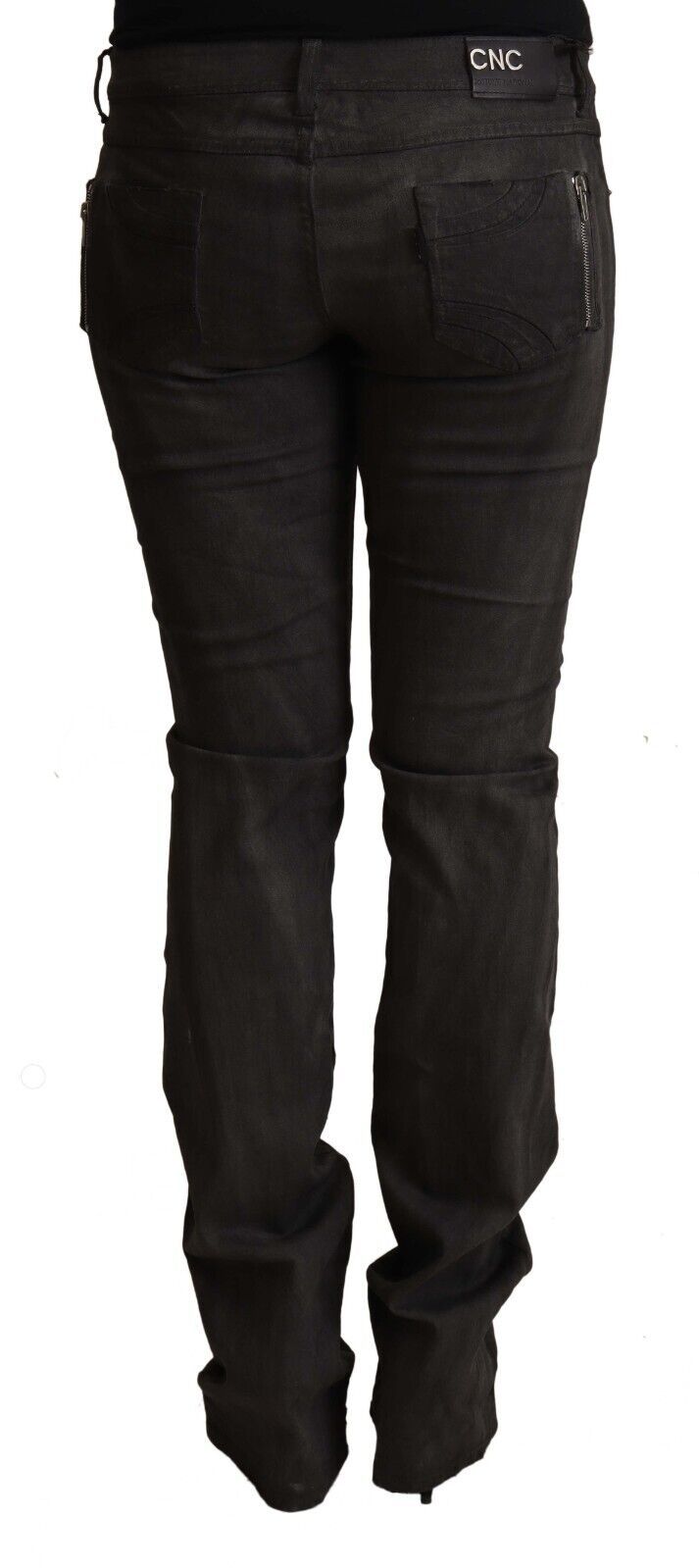 Black cotton mid-rise skinny pants seen from the back with back pockets and a CNC logo patch