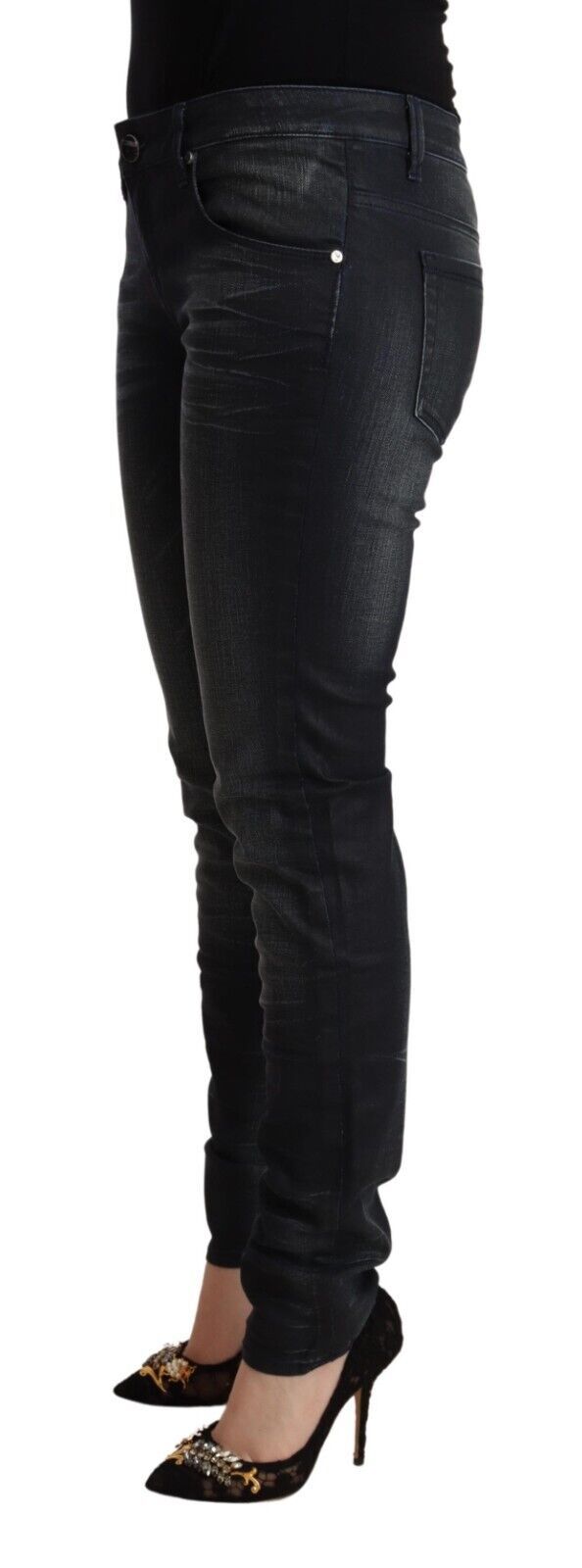 Black washed cotton low-waist slim-fit denim jeans worn with high heels