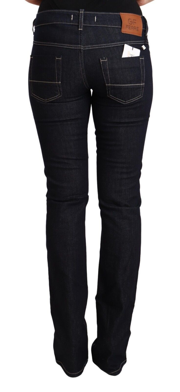 Black stretch cotton low waist skinny denim jeans shown from behind
