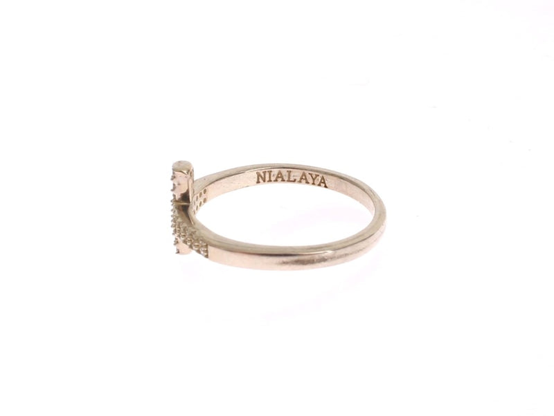 Silver 925 ring featuring a cross design with embedded CZ stones and the Nialaya brand name engraved inside