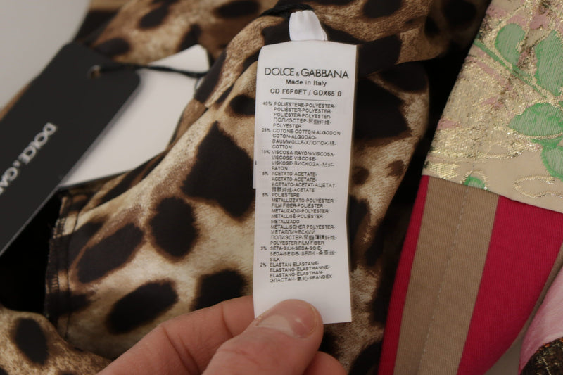 Close-up of Dolce and Gabbana garment tags showing leopard print fabric and material composition labels