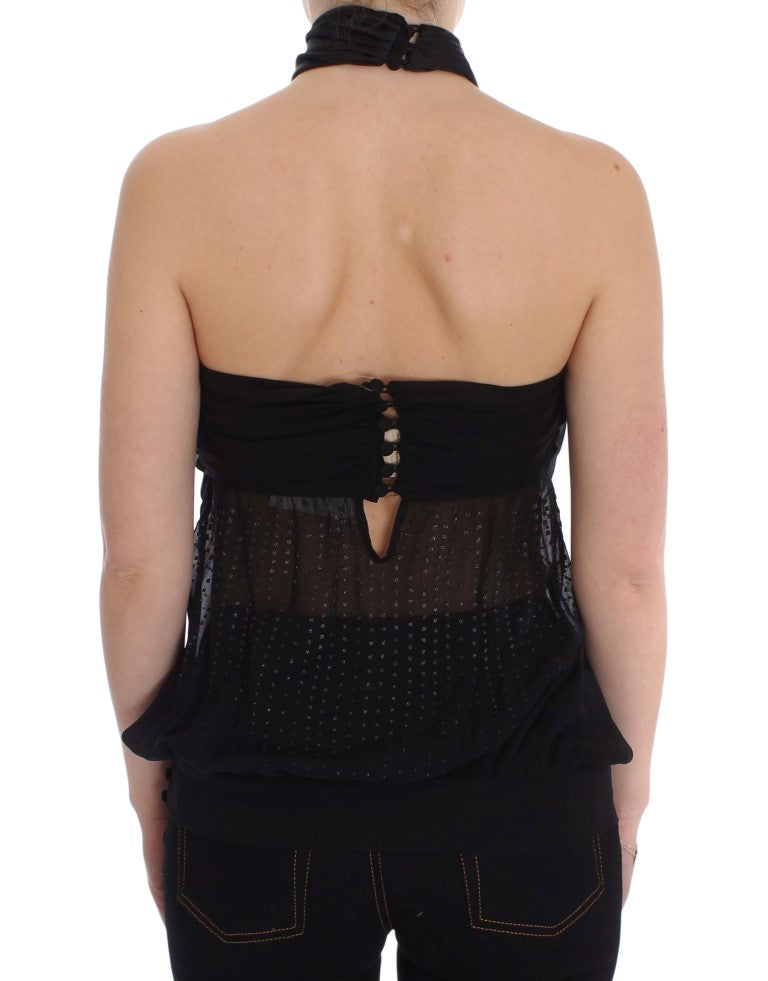 Black sleeveless halter neck blouse with sheer patterned fabric and button accents