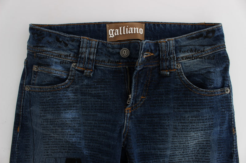 Blue wash cotton blend slim fit bootcut jeans with newspaper print and Galliano back label