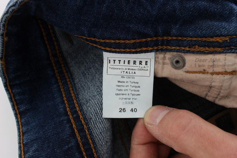 Blue wash cotton blend slim fit bootcut jeans interior label closeup