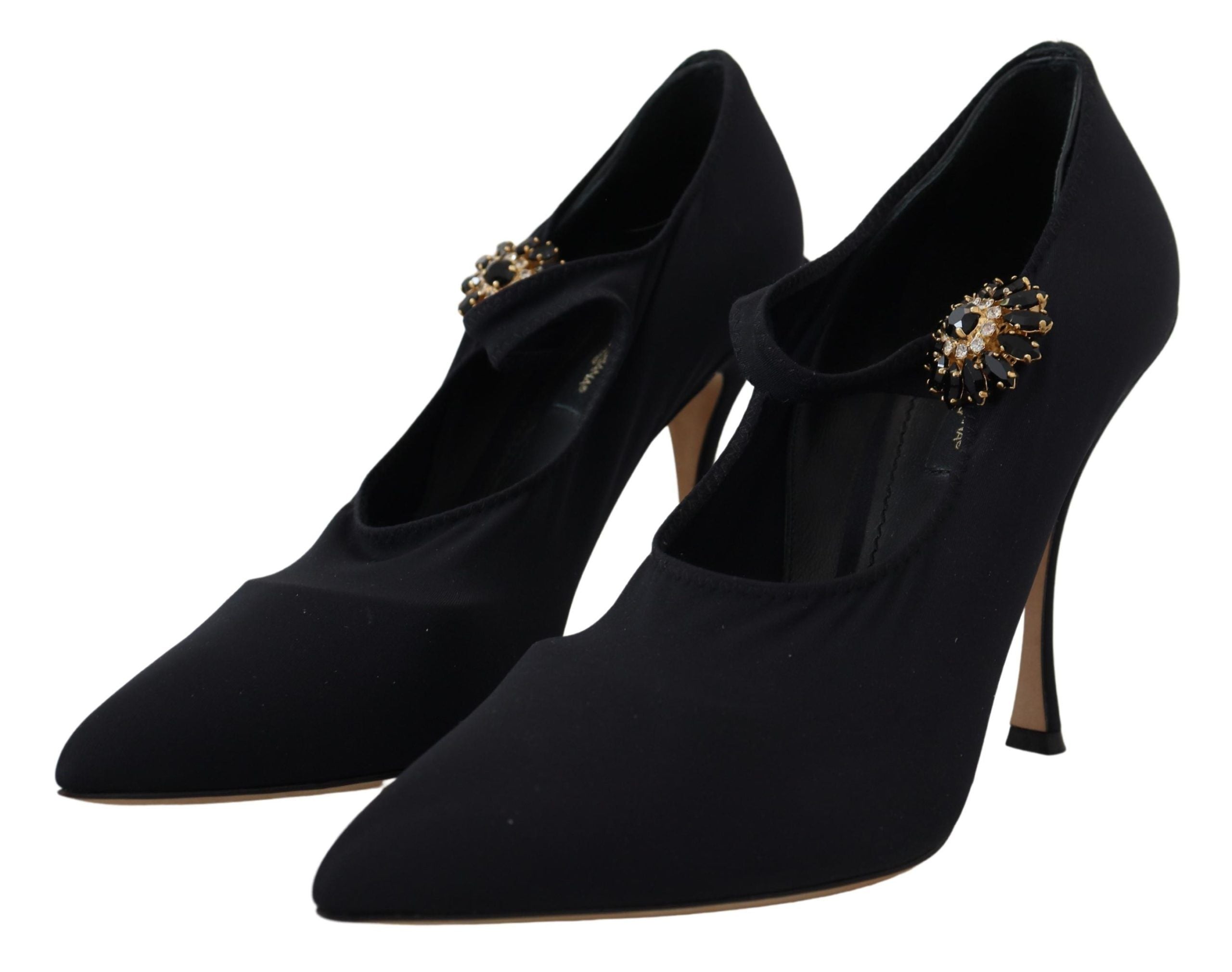 Dolce & Gabbana black stretch fabric pumps with pointed toes, stiletto heels, and crystal-embellished Mary Jane straps.
