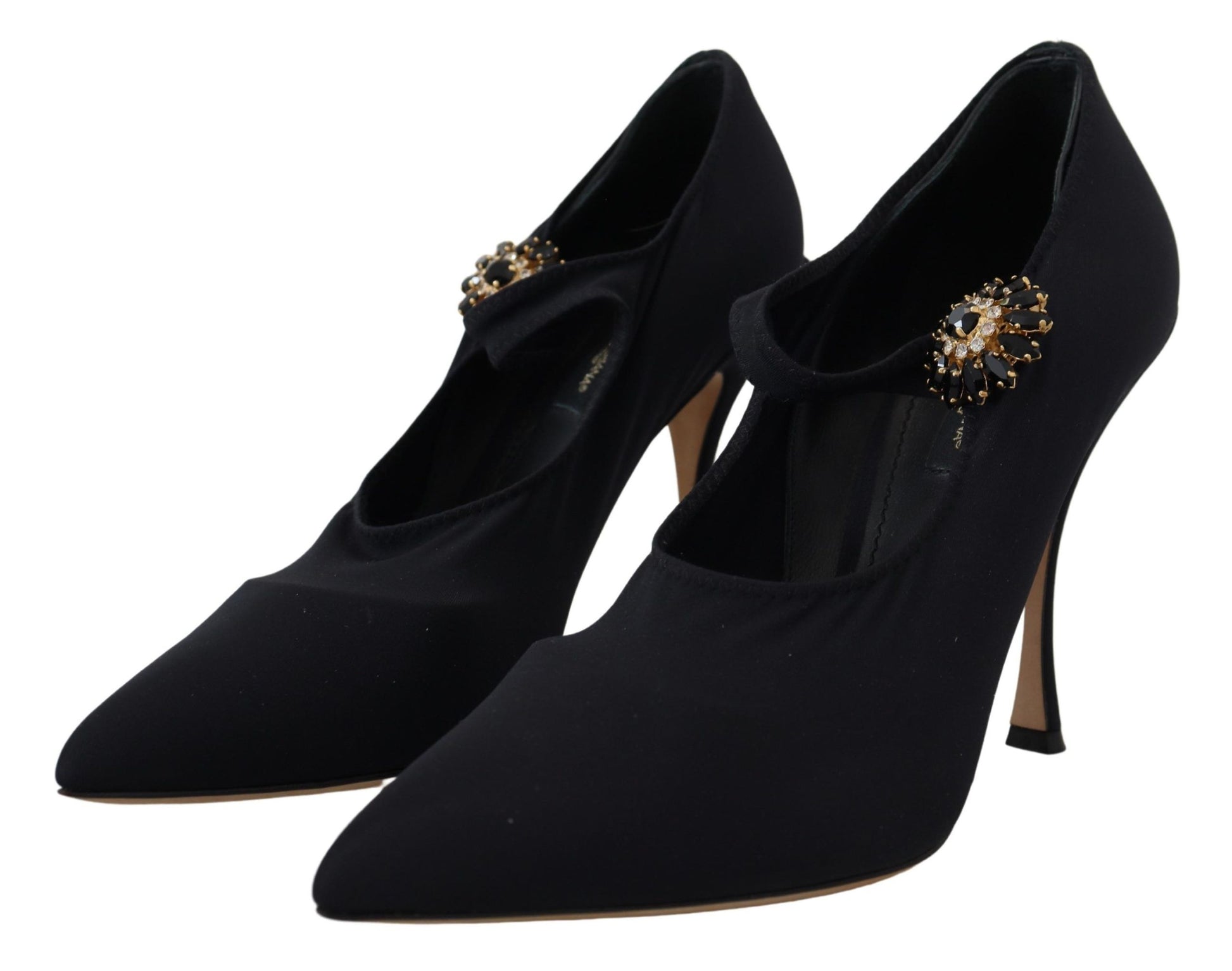 Dolce & Gabbana black stretch fabric pumps with pointed toes, stiletto heels, and crystal-embellished Mary Jane straps.