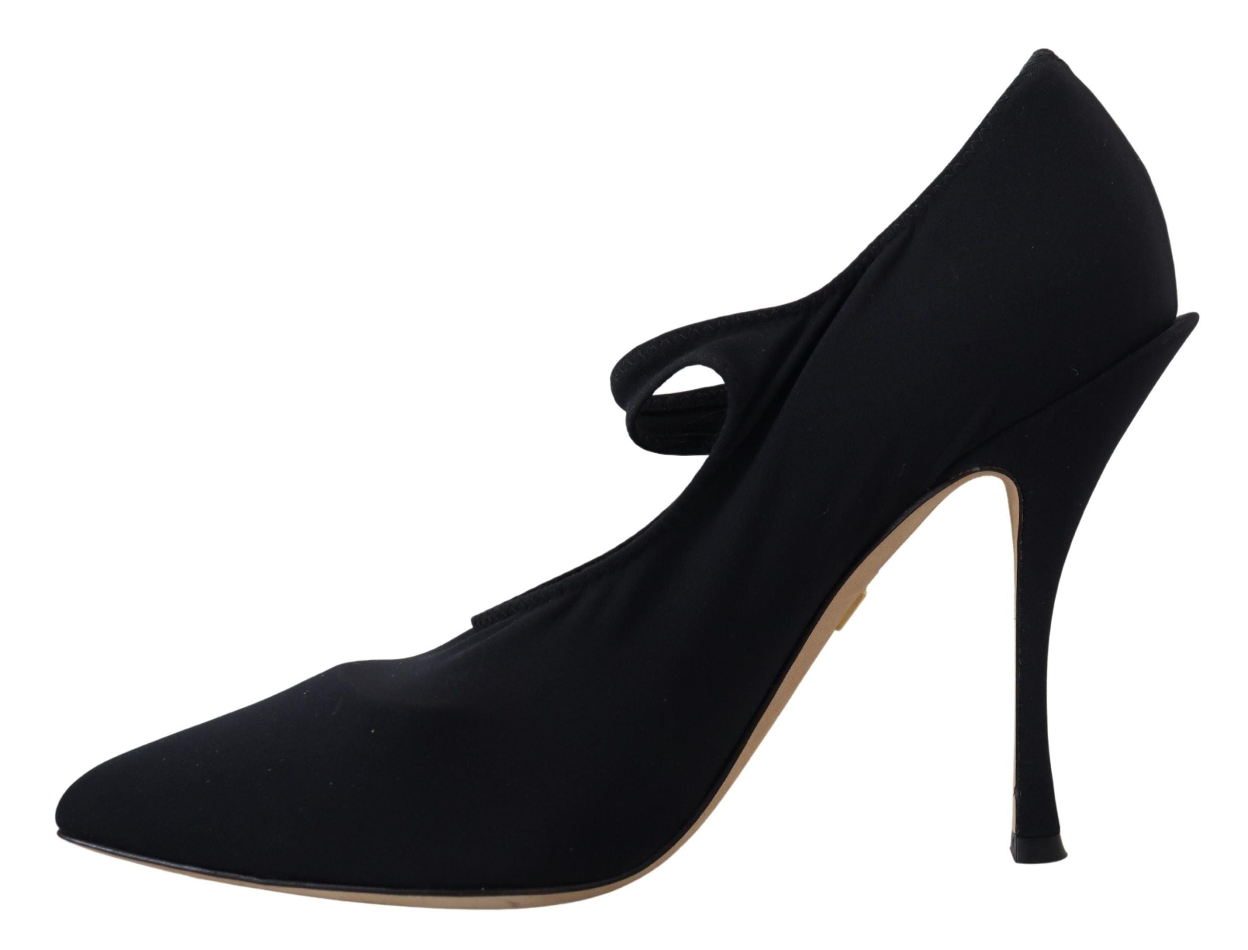 Black stretch fabric pointed-toe pump with a thin ankle strap and high stiletto heel by Dolce & Gabbana.