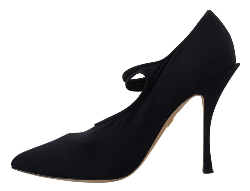 Black stretch fabric pointed-toe pump with a thin ankle strap and high stiletto heel by Dolce & Gabbana.
