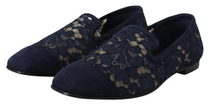 Dolce & Gabbana navy blue floral lace slip-on loafers with suede rounded caps and flat soles.