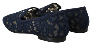 Dolce & Gabbana navy blue floral lace slip-on loafers with a suede trim and flat black heels.