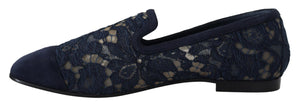 Dolce & Gabbana navy blue floral lace slip-on loafers with a rounded suede toe and low flat heel.