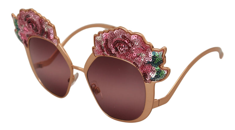 Pink gold metal sunglasses with pink sequin rose embroidery on the upper rims and tinted lenses