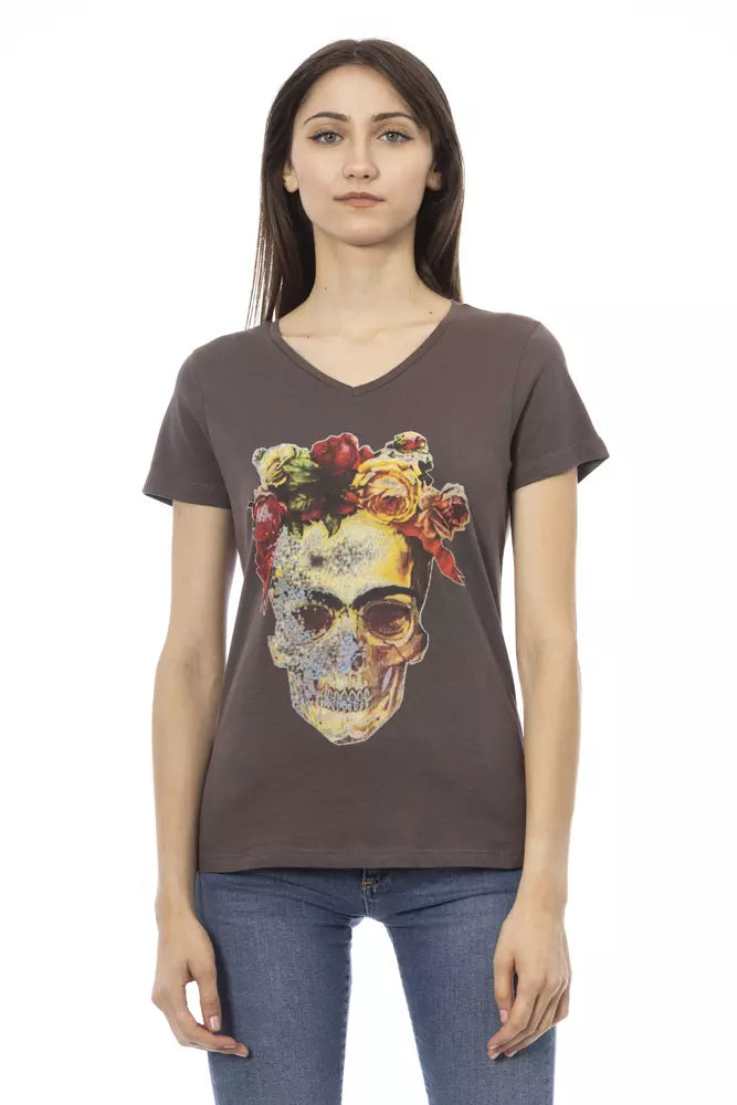 Brown cotton v-neck t-shirt with a colorful floral skull graphic on the front worn by a woman