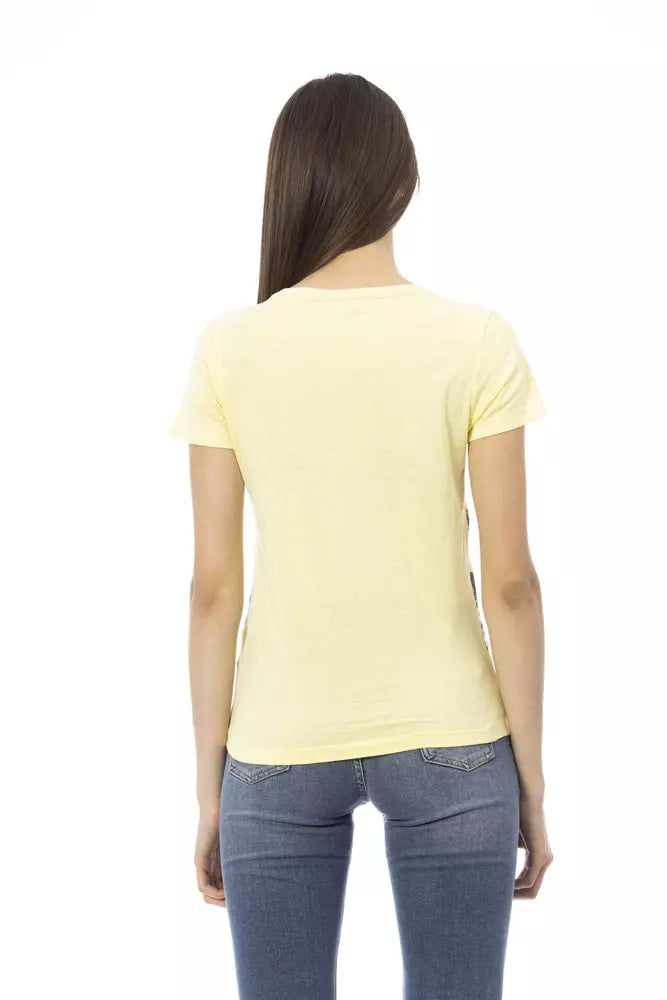 Yellow cotton women T-shirt viewed from the back worn with blue jeans