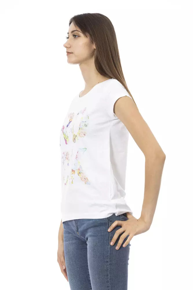 Woman wearing a white cotton t-shirt with a colorful graphic print and blue jeans