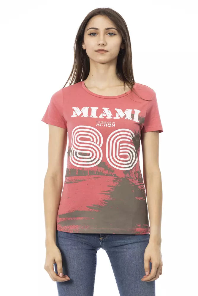 Pink cotton crewneck t-shirt with short sleeves and bold white Miami 86 graphic print on the front